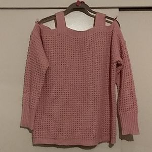 Woman off the shoulder knit sweater